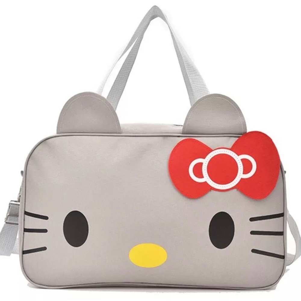 Hello kitty big grey duffel bag w/adjustable strap and dual handles.NWT